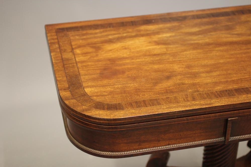A REGENCY MAHOGANY FOLDING TEA TABLE Image
