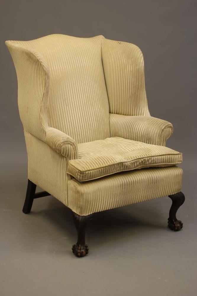 A MAHOGANY FRAMED WING BACK ARMCHAIR of Georgian design Image