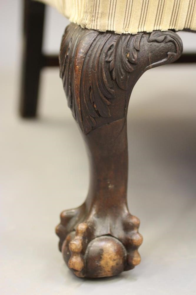 A MAHOGANY FRAMED WING BACK ARMCHAIR of Georgian design Image