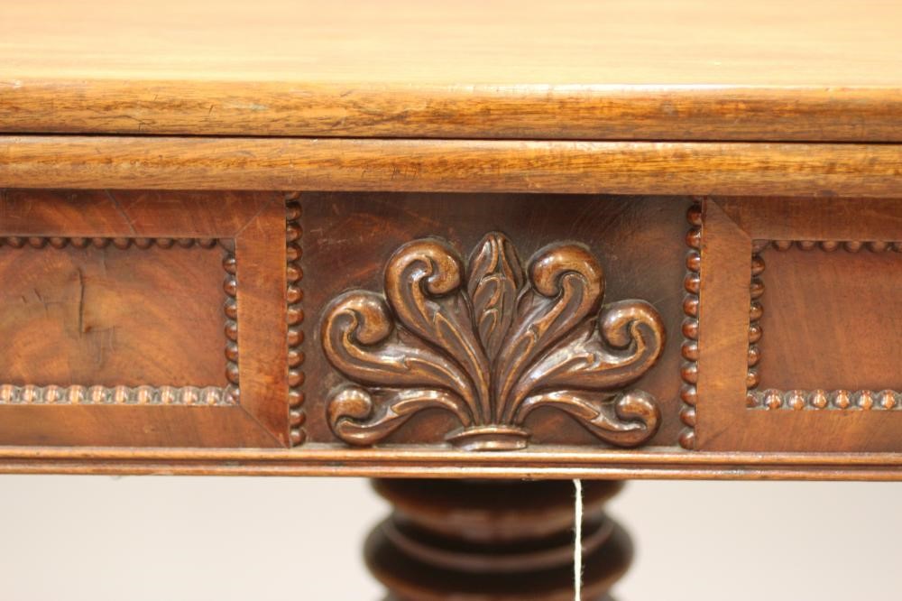 A REGENCY MAHOGANY FOLDING BREAKFAST TABLE Image