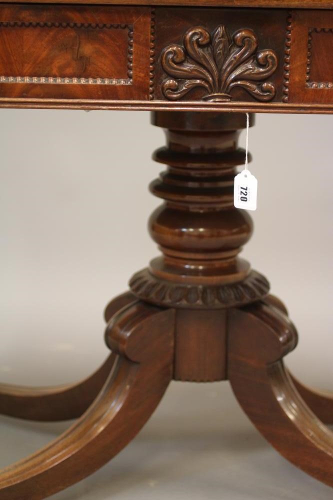 A REGENCY MAHOGANY FOLDING BREAKFAST TABLE Image