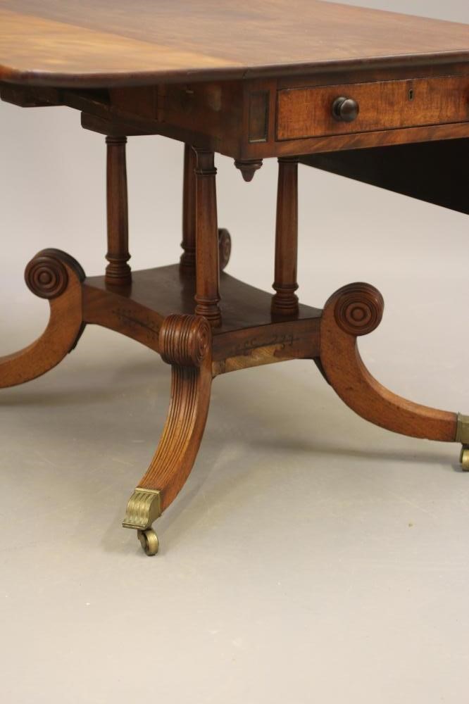 A REGENCY MAHOGANY PEMBROKE TABLE Image
