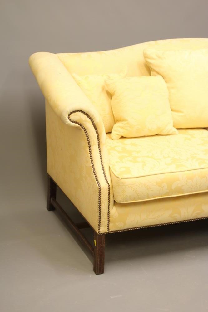 A GEORGIAN STYLE HUMP BACKED SOFA Image
