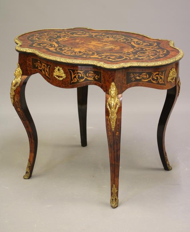 A LOUIS XV STYLE YEW WOOD AND MARQUETRY CENTRE TABLE Image