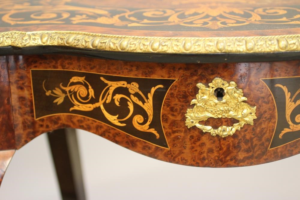 A LOUIS XV STYLE YEW WOOD AND MARQUETRY CENTRE TABLE Image