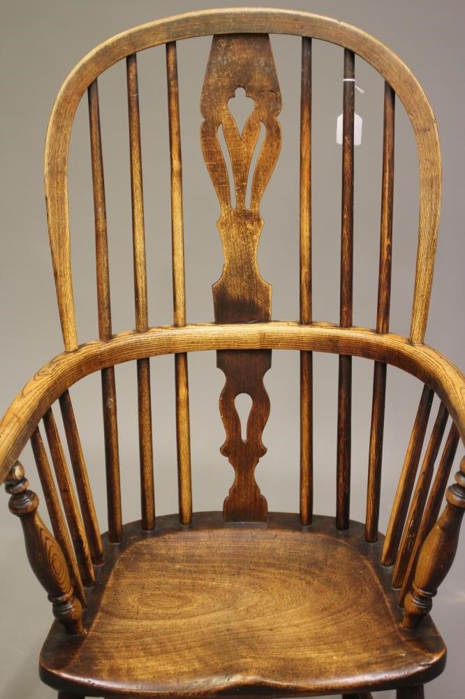 AN ASH AND ELM WINDSOR ARMCHAIR Image