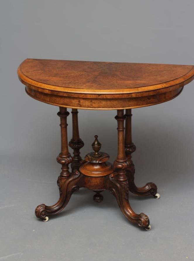 A PAIR OF VICTORIAN BURR WALNUT FOLDING CARD TABLES Image