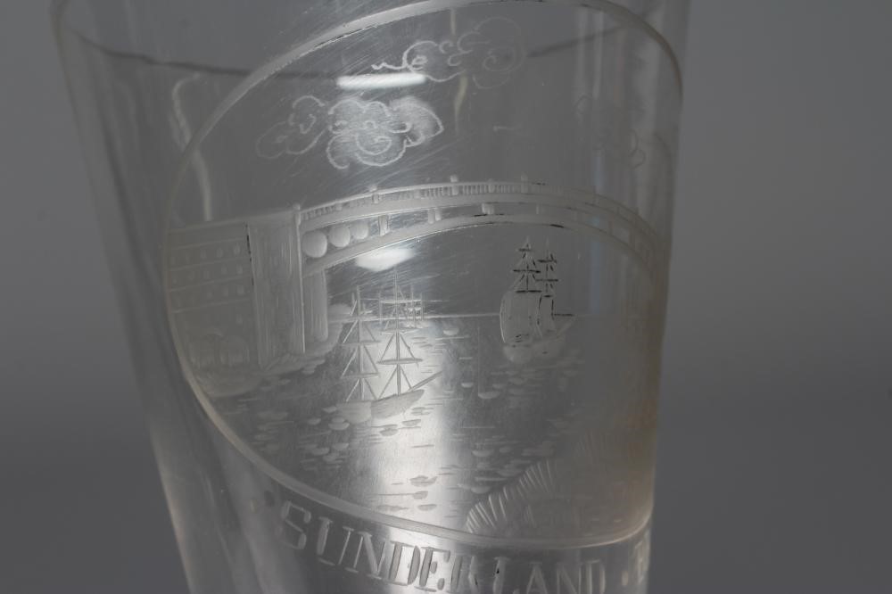 A SUNDERLAND BRIDGE CLEAR GLASS GOBLET, the bucket bowl wheel engraved with a titled oval panel, Image