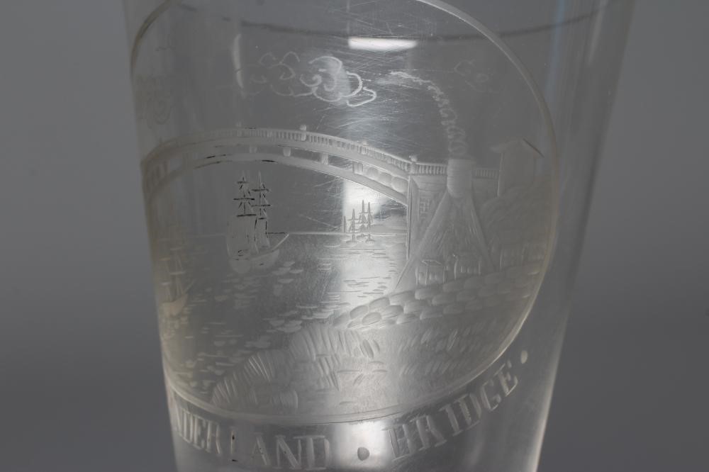 A SUNDERLAND BRIDGE CLEAR GLASS GOBLET, the bucket bowl wheel engraved with a titled oval panel, Image