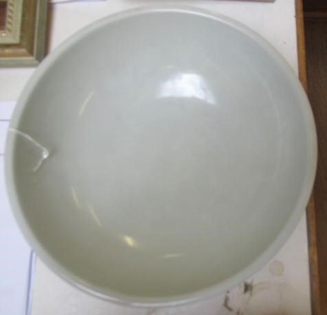 A CHINESE PORCELAIN SHALLOW BOWL of plain circular form, the exterior painted in underglaze blue Image