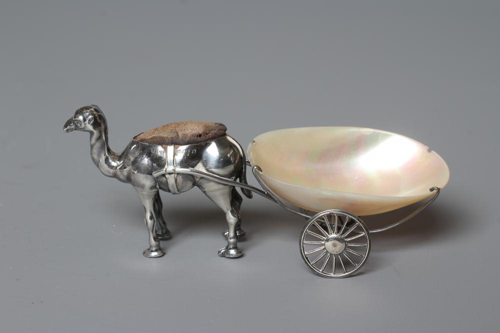 A NOVELTY SILVER PIN CUSHION by Adie & Lovekin Ltd. Image