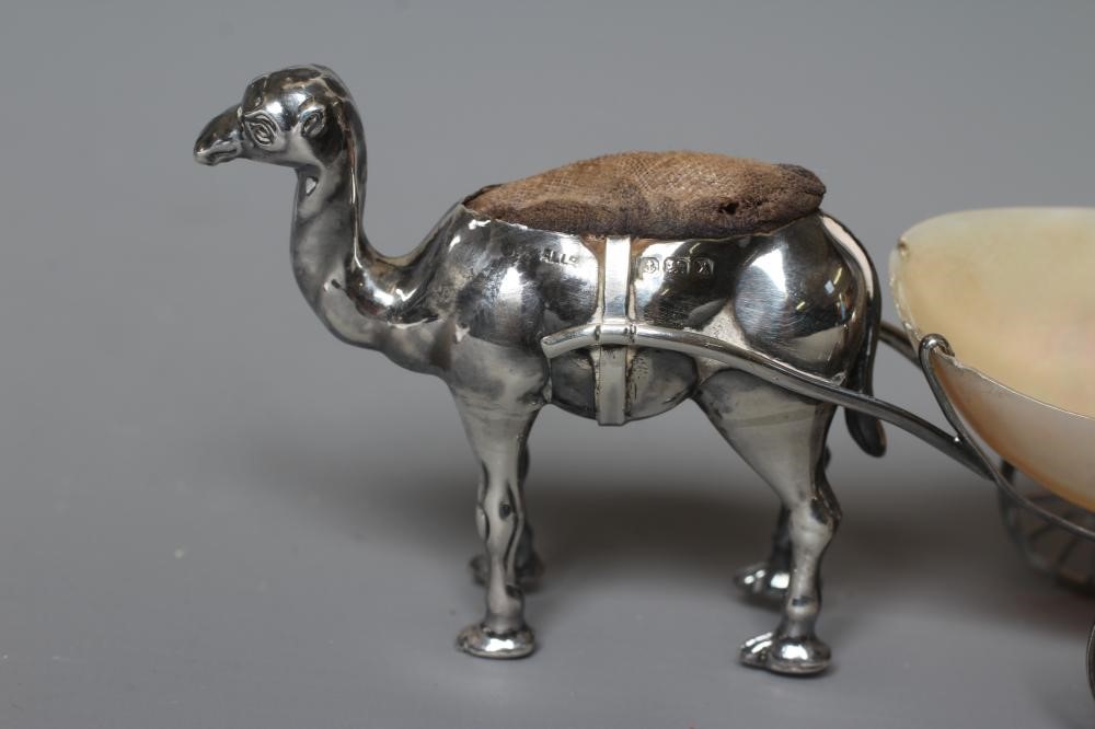 A NOVELTY SILVER PIN CUSHION by Adie & Lovekin Ltd. Image