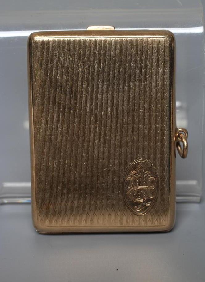 A 9CT GOLD MATCH BOOK CASE by Wm. Neale & Son Ltd. Image