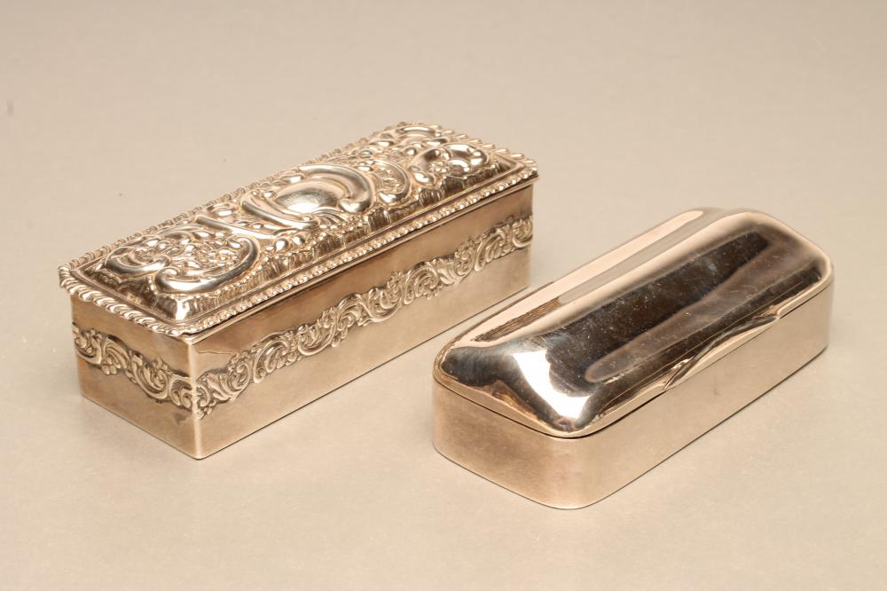 A SILVER RING CASE Image