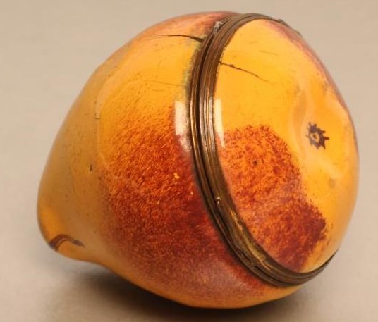 A SOUTH STAFFORDSHIRE ENAMEL PEAR BONBONIERE Image