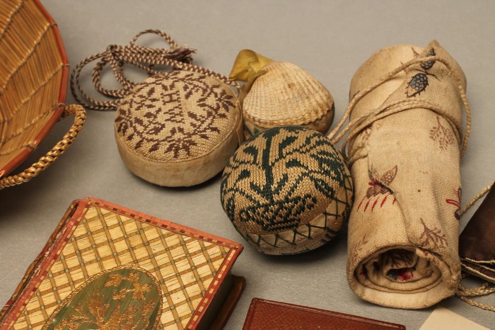 A COLLECTION OF GEORGIAN SEWING ACCOUTREMENTS including three finely knitted pin-cushions Image