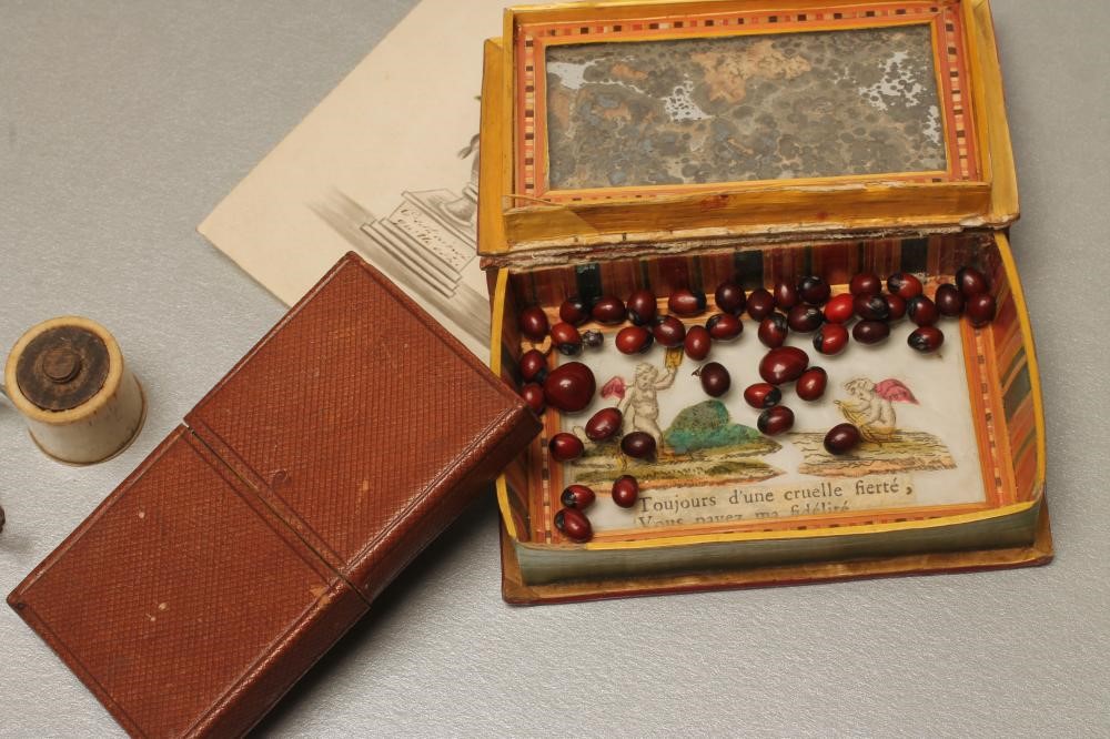 A COLLECTION OF GEORGIAN SEWING ACCOUTREMENTS including three finely knitted pin-cushions Image