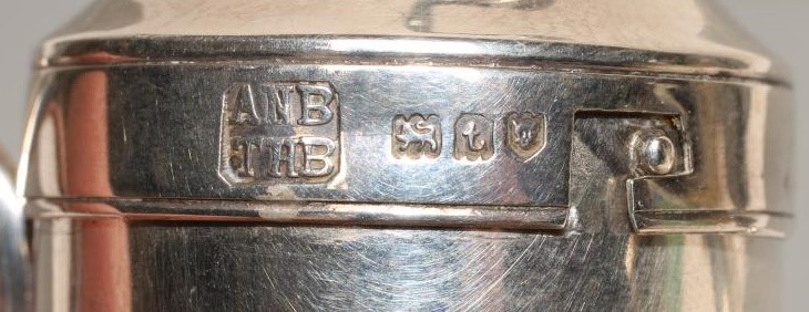 A SILVER NOVELTY SCENT DISPENSER Image