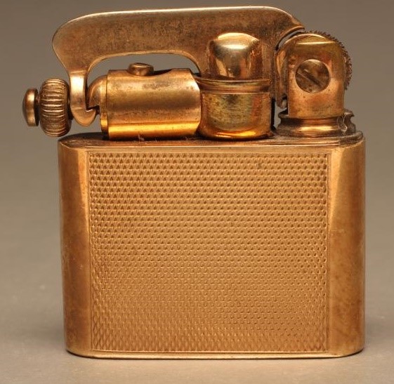 AN ART DECO 9CT GOLD "PREMIER" CIGARETTE LIGHTER Image