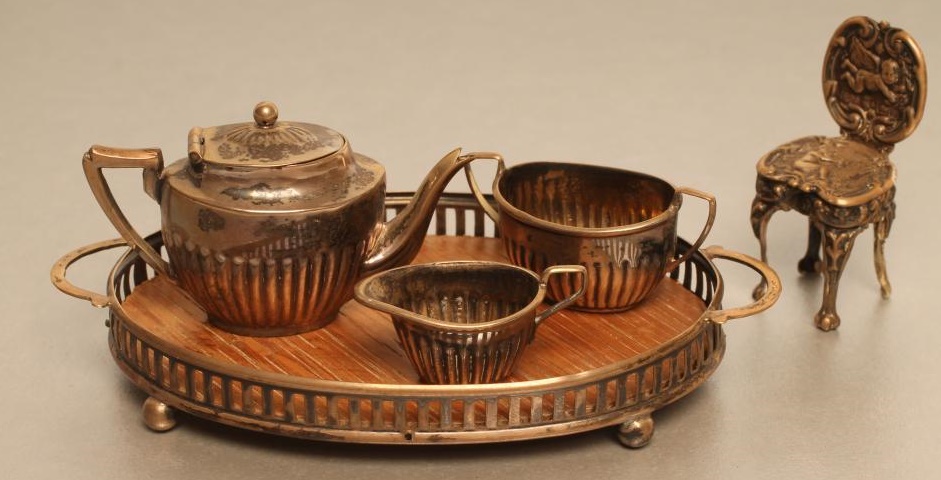 AN EDWARDIAN SILVER MINIATURE THREE PIECE TEA SERVICE Image