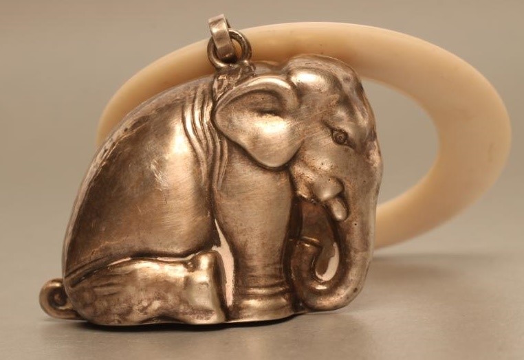 A SILVER NOVELTY RATTLE Image