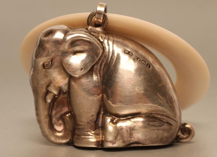 A SILVER NOVELTY RATTLE Image