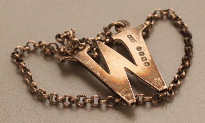 A VICTORIAN SILVER WHISKY DECANTER LABEL Image