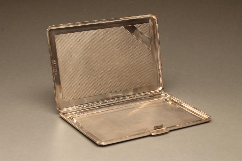 AN ART DECO SILVER CIGARETTE CASE Image