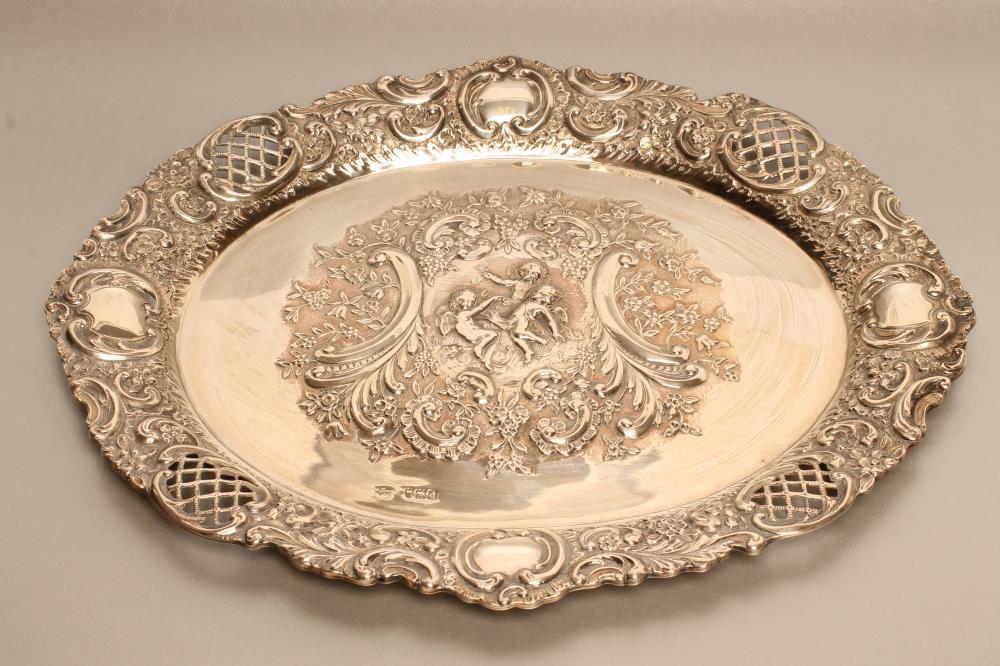 A LATE VICTORIAN SILVER DRESSING TABLE TRAY Image