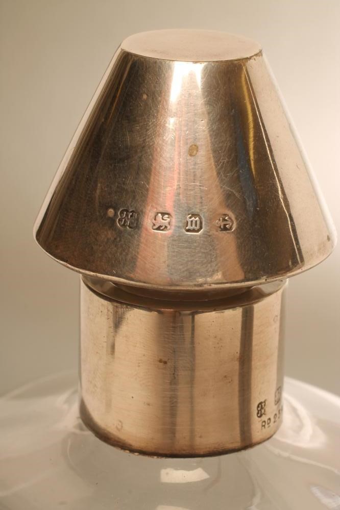 A LATE VICTORIAN SILVER MOUNTED GLASS NOVELTY SPIRIT DECANTER Image