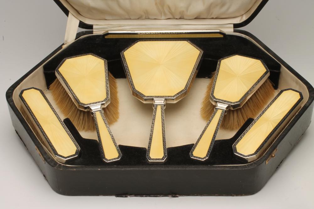 AN ART DECO SIX PIECE SILVER DRESSING TABLE SET Image