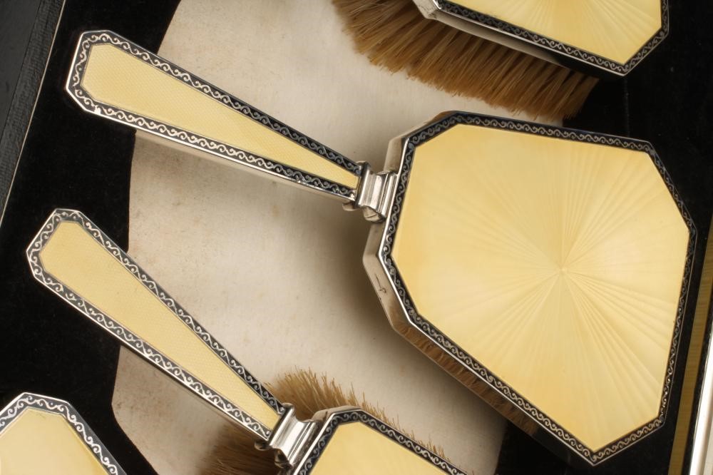 AN ART DECO SIX PIECE SILVER DRESSING TABLE SET Image