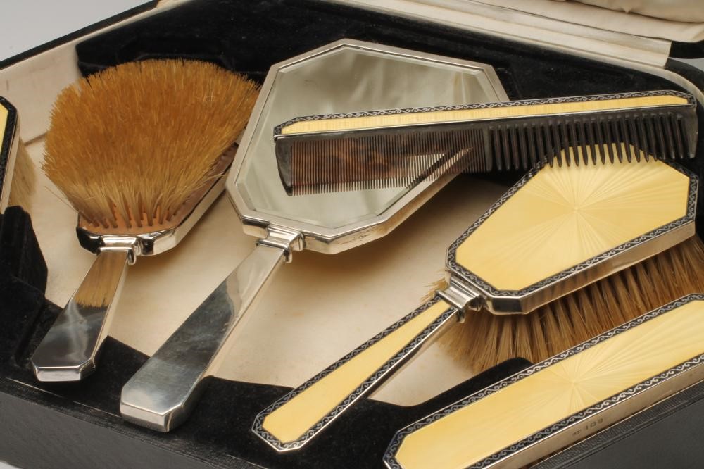 AN ART DECO SIX PIECE SILVER DRESSING TABLE SET Image