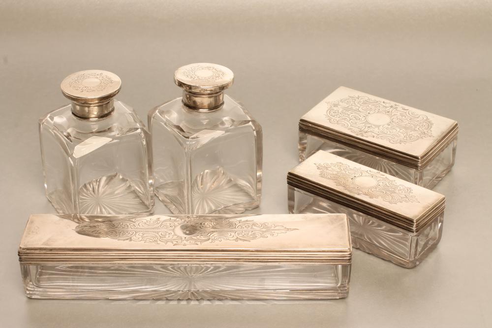 AN EARLY VICTORIAN SILVER TRAVELLING DRESSING SET Image