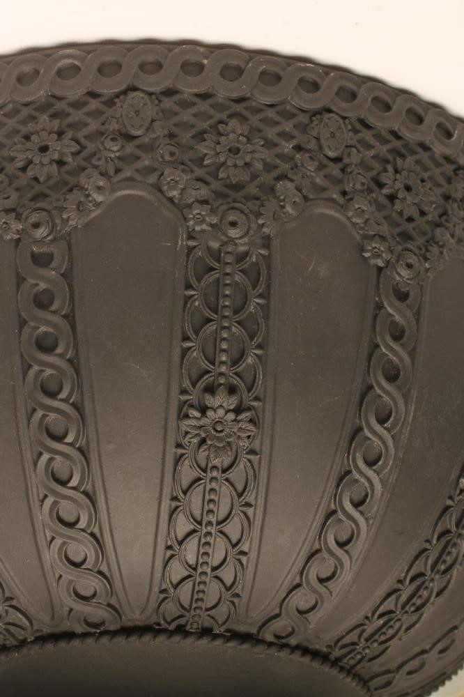 A VICTORIAN WEDGWOOD BLACK JASPERWARE PEDESTAL BOWL Image