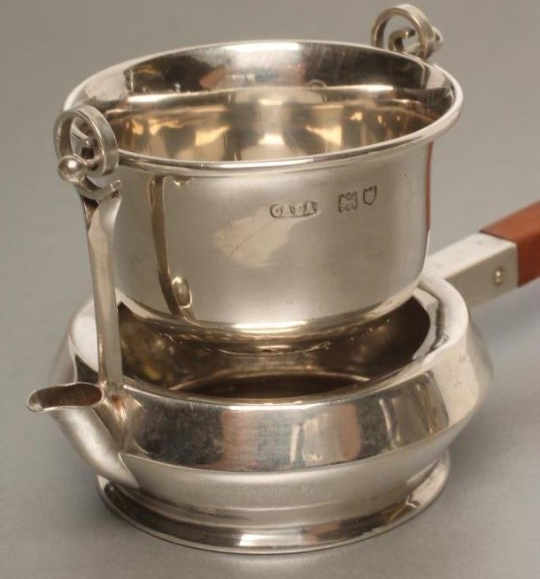 AN EDWARDIAN SILVER TEA STRAINER Image
