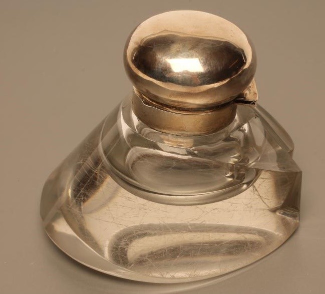 A SILVER MOUNTED NOVELTY GLASS INKWELL Image