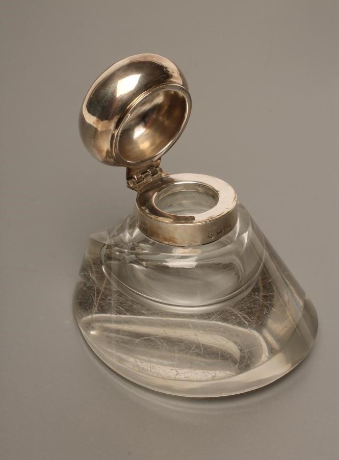 A SILVER MOUNTED NOVELTY GLASS INKWELL Image