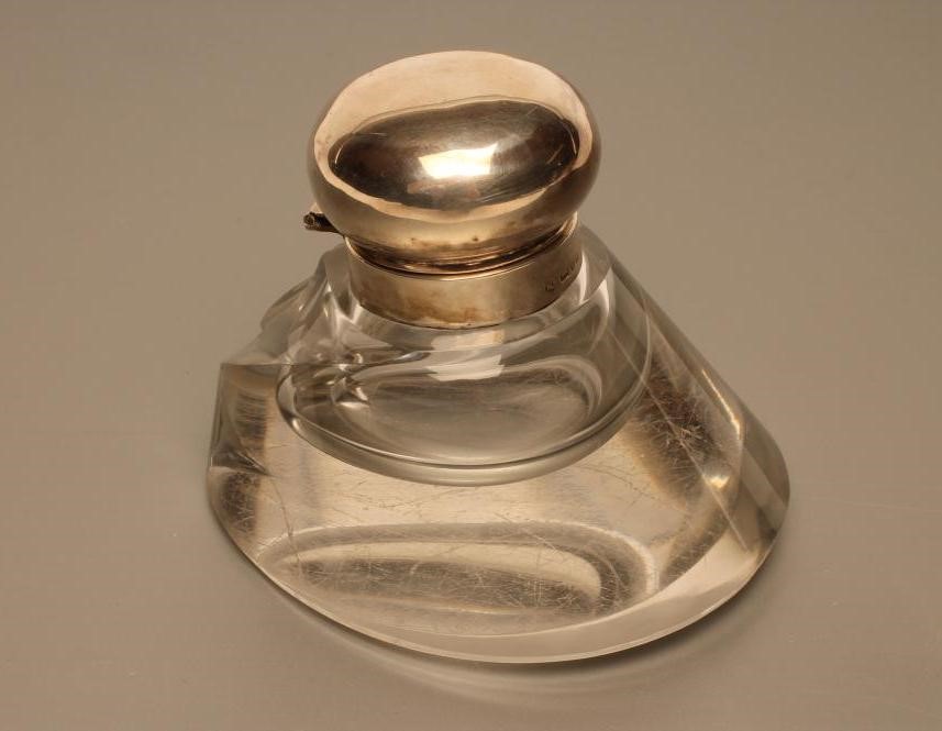 A SILVER MOUNTED NOVELTY GLASS INKWELL Image