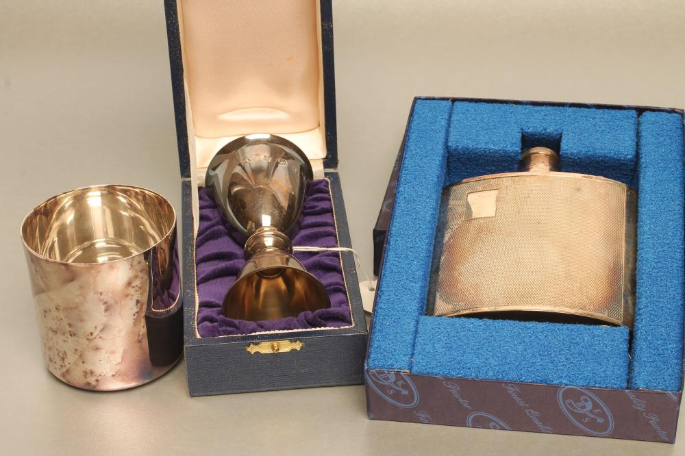 A SILVER HIP FLASK Image