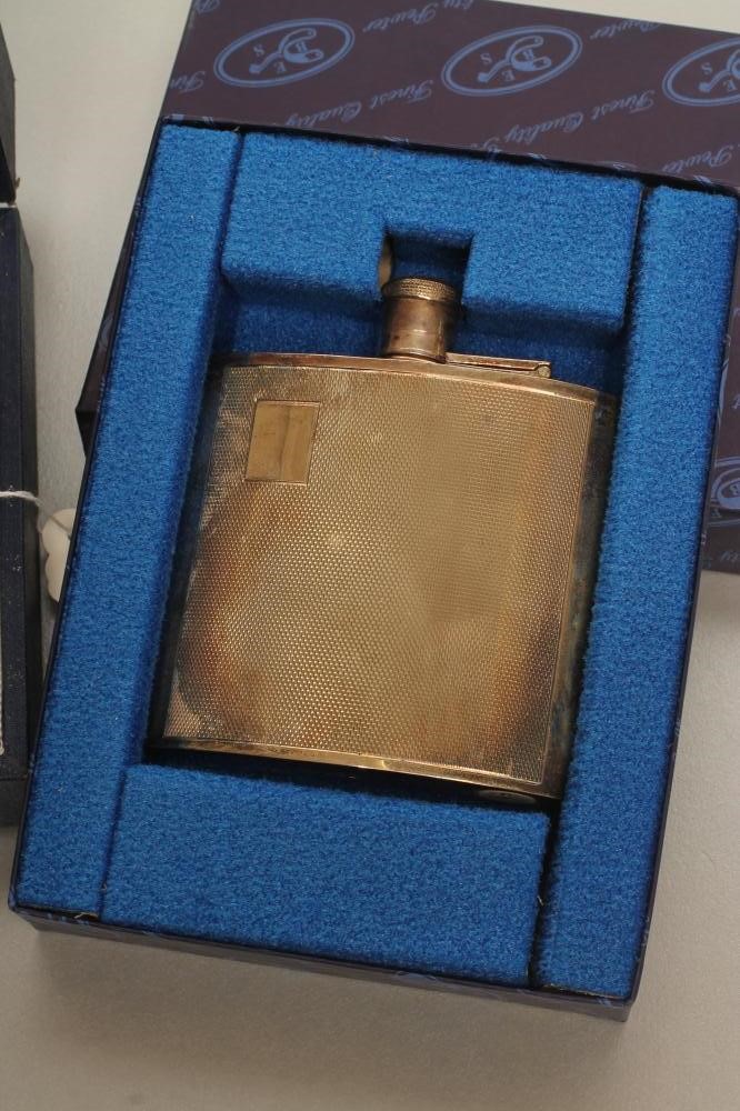 A SILVER HIP FLASK Image