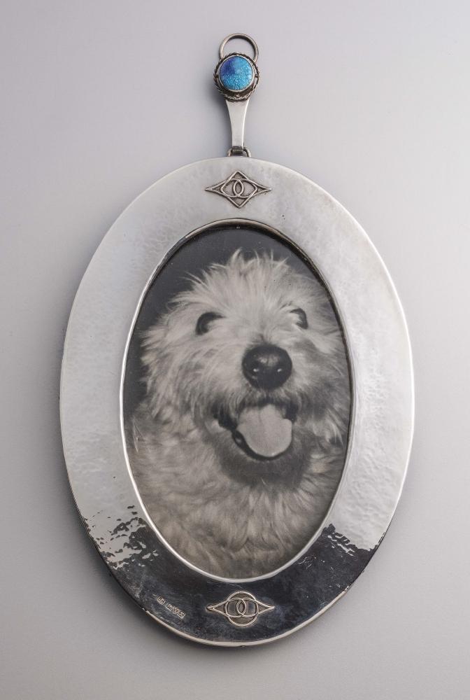 OF LOCAL INTEREST SILVER - an Arts and Crafts hanging photograph frame Image
