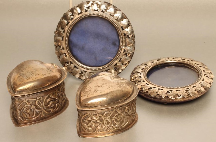 A PAIR OF EDWARDIAN SILVER PHOTOGRAPH FRAMES Image