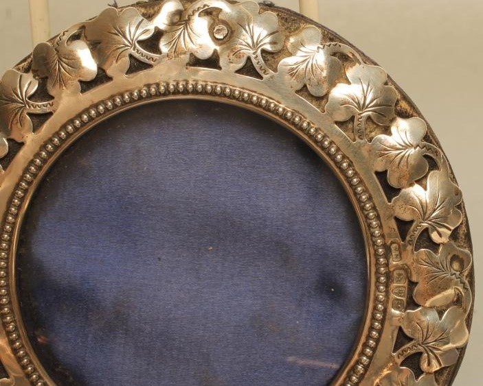 A PAIR OF EDWARDIAN SILVER PHOTOGRAPH FRAMES Image
