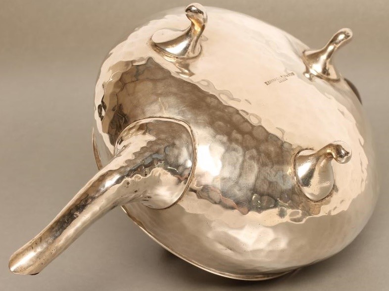 AN ARTS AND CRAFTS SILVER TEAPOT Image