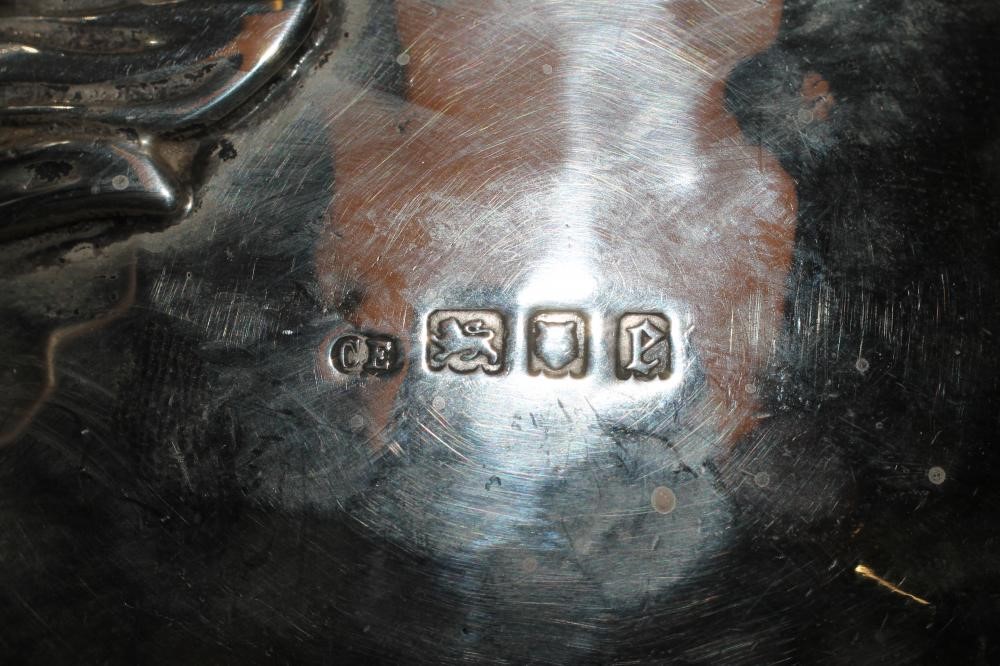 AN ARTS AND CRAFTS SILVER TEAPOT Image