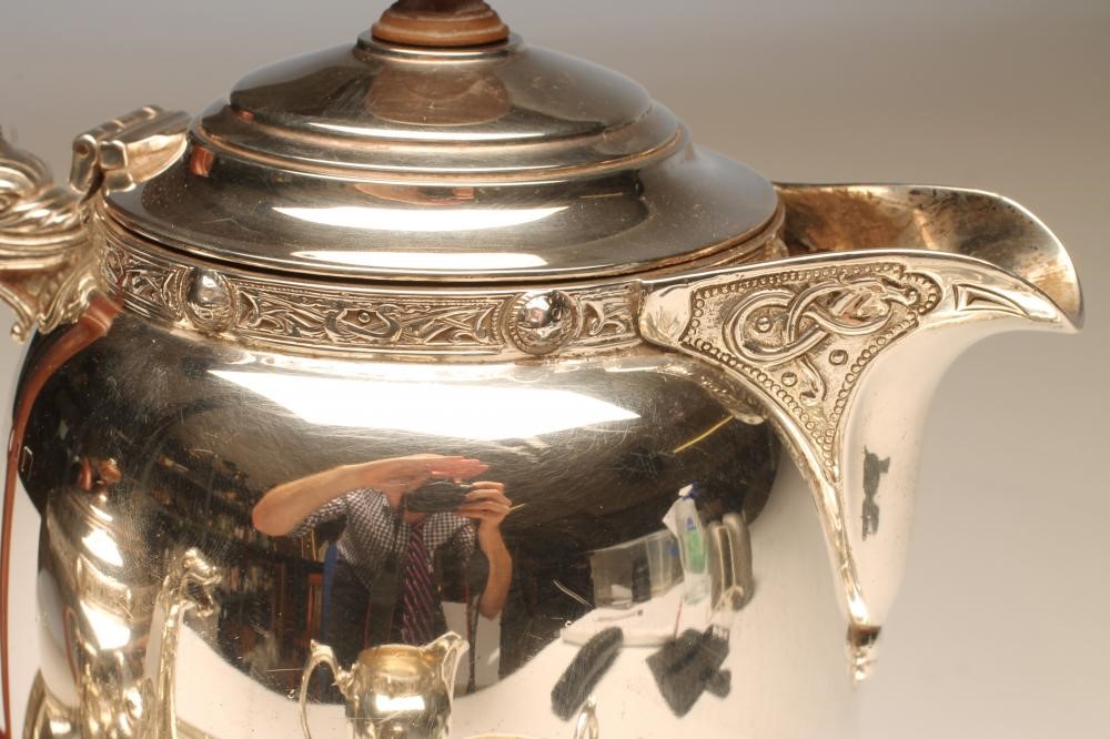 A SILVER FOUR PIECE TEA AND COFFEE SERVICE Image