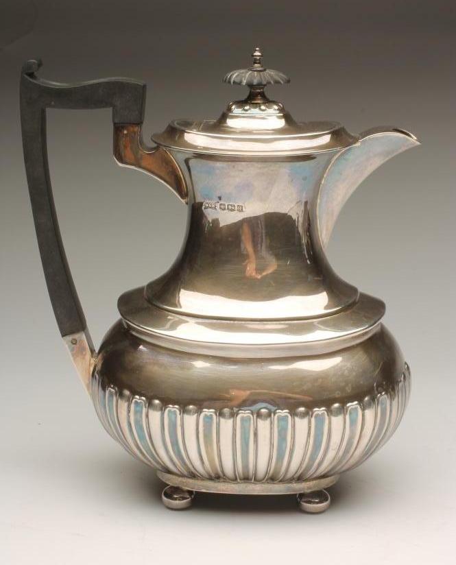 *A SILVER COFFEE POT Image