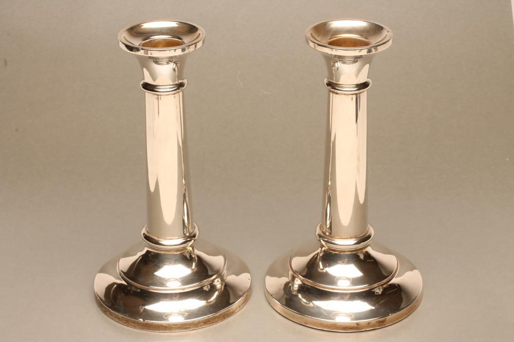 A PAIR OF SILVER CANDLESTICKS Image