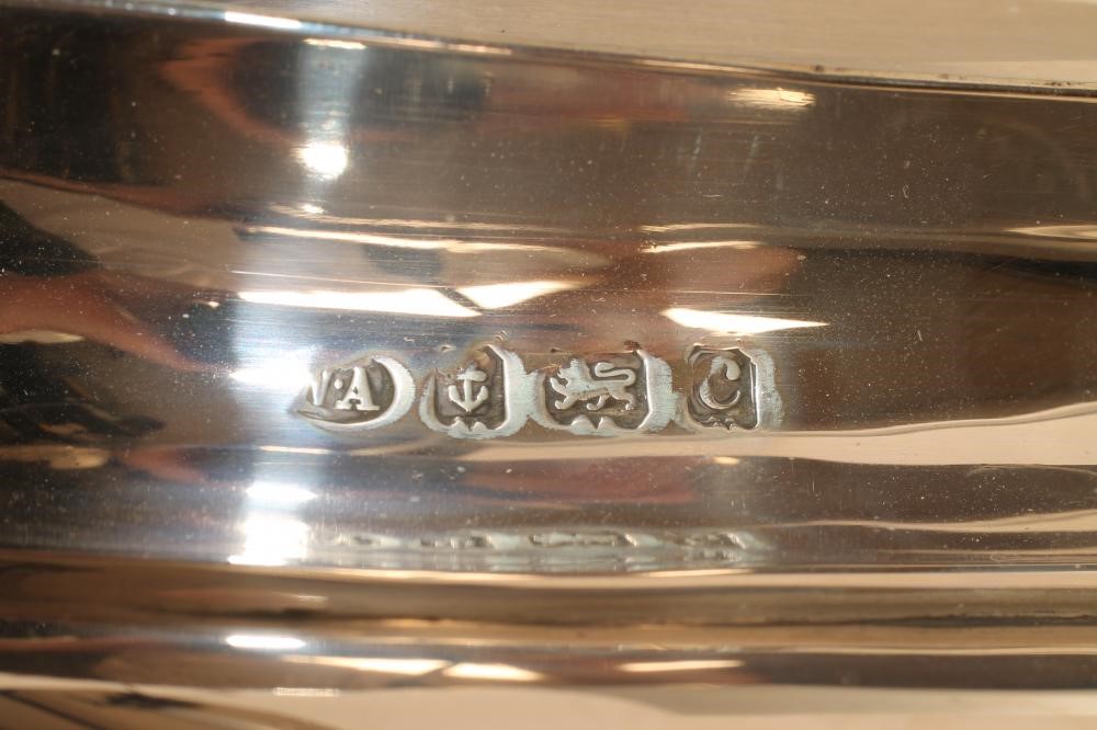 AN EDWARDIAN BACHELOR'S SILVER THREE PIECE TEA SERVICE Image